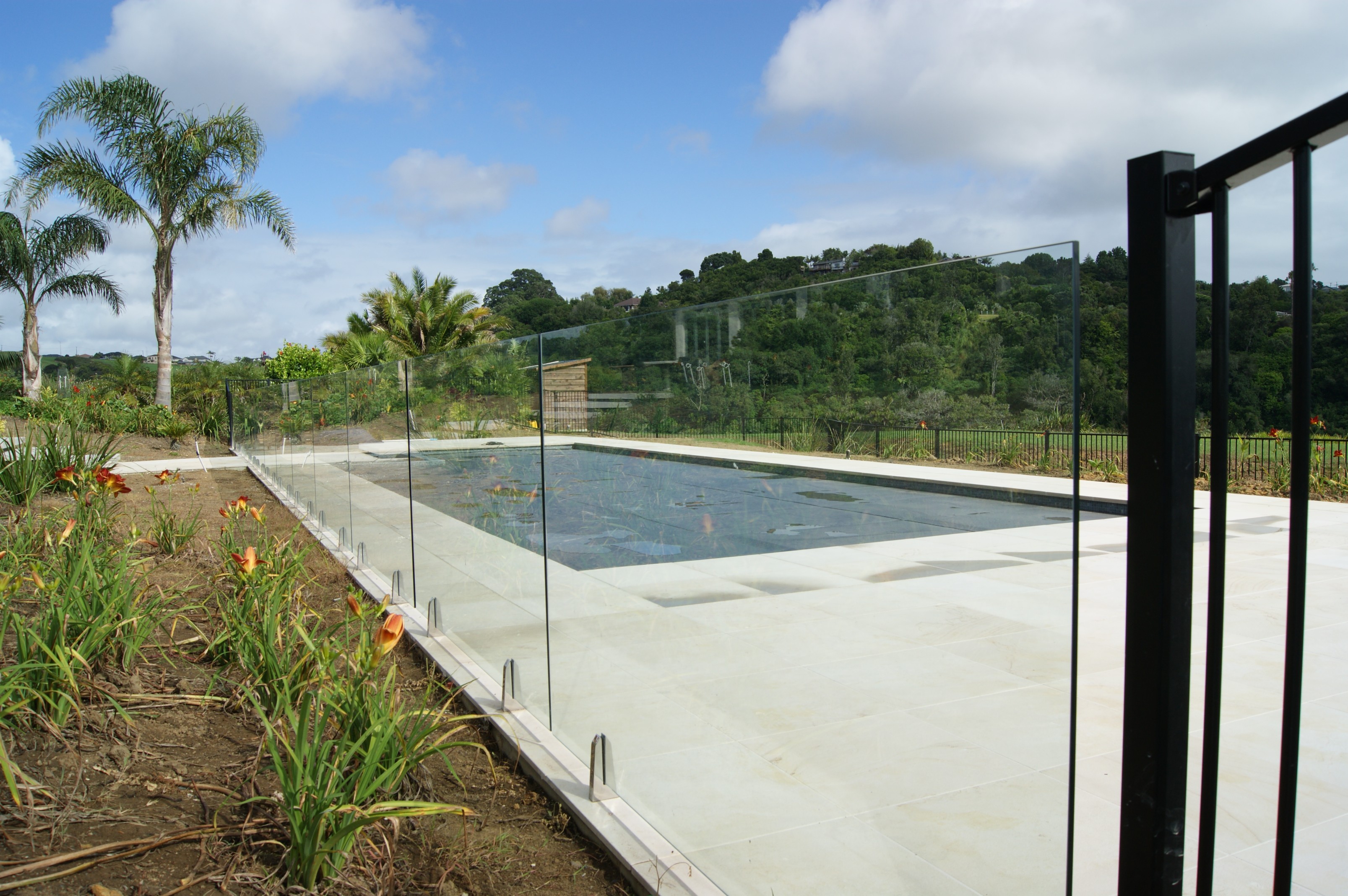 Glass pool fencing compliant with New Zealand safety standards in Auckland