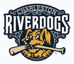 man in blue dress shirt sitting on rolling chair inside room with monitors