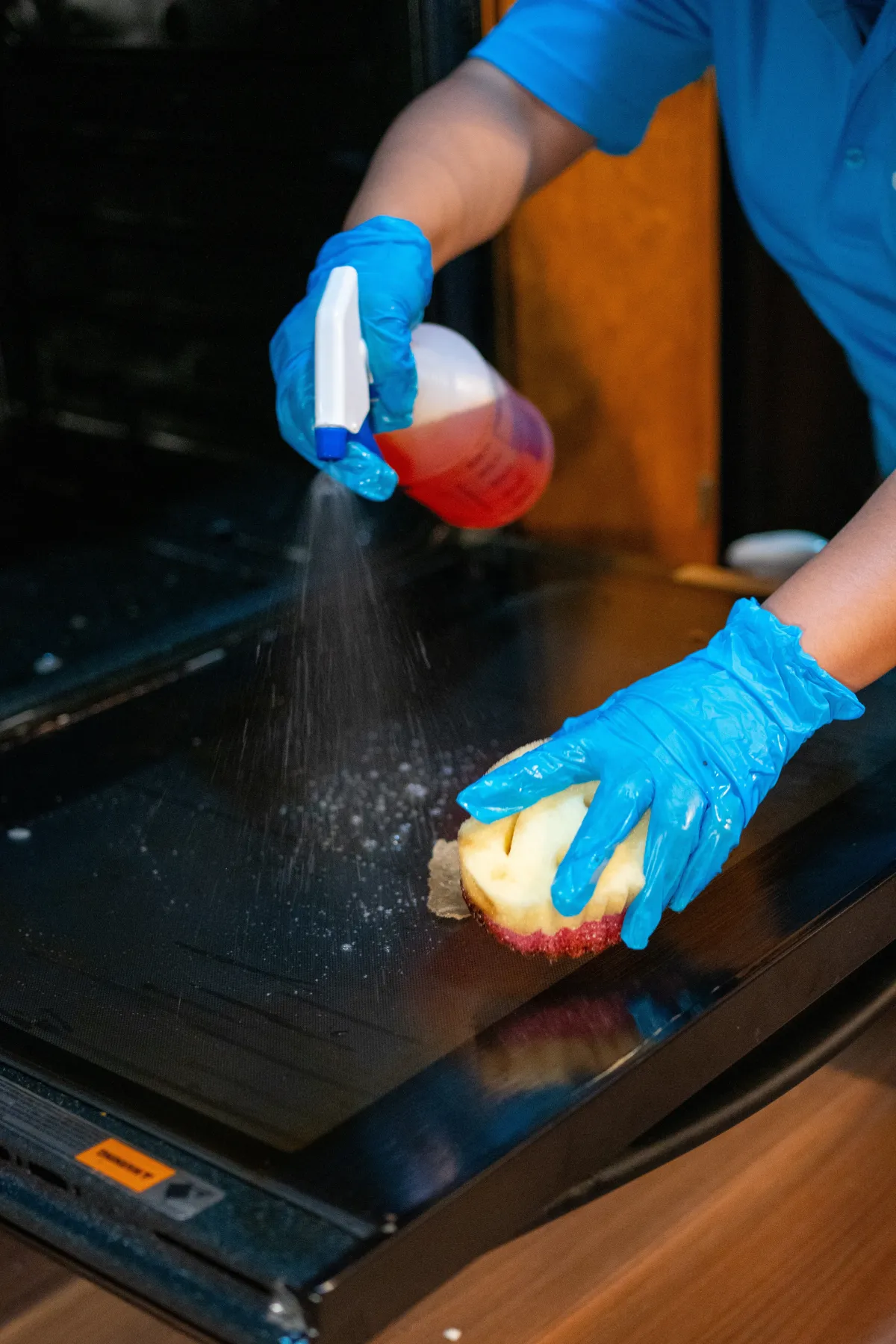 Casita Clean performing detailed oven cleaning with degreaser during a deep clean in New Lenox, IL