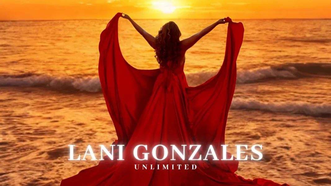 Women holding hands on a beach during a breakthrough retreat, signifying community, healing, and rising together.