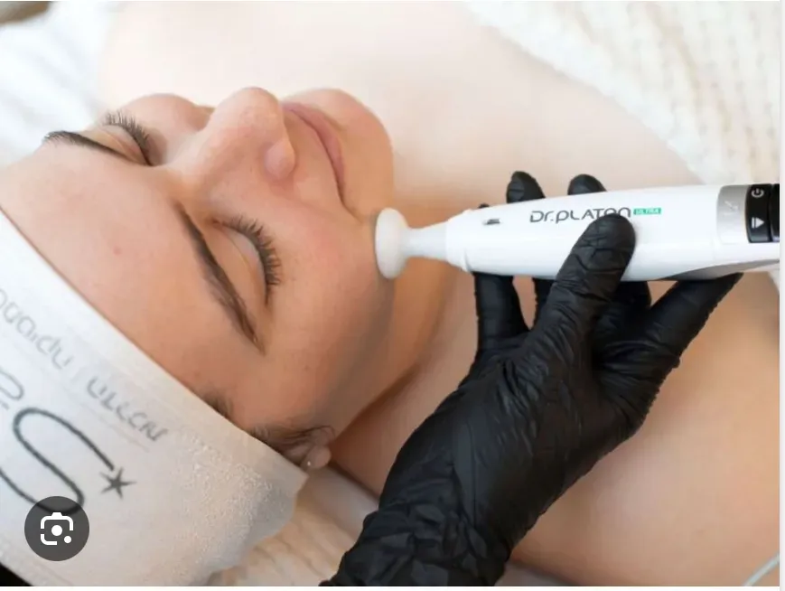 person in white dress shirt wearing green and white hat