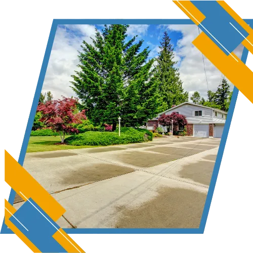 Driveway contractor in Fayetteville, NC preparing a concrete surface