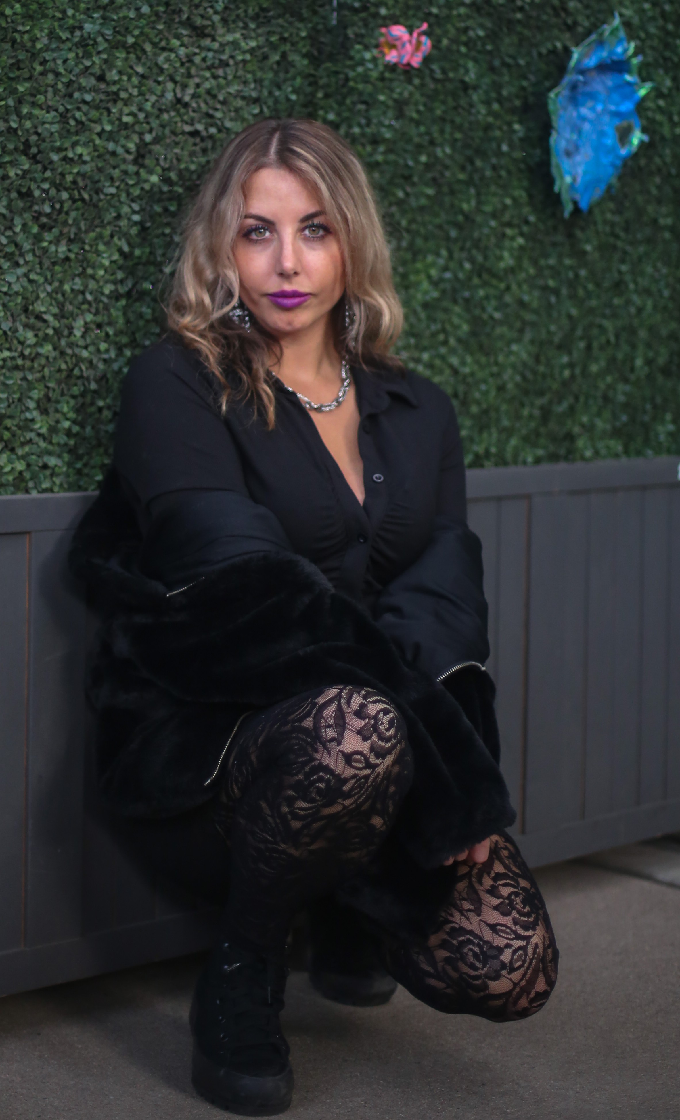 Portrait of founder Kaitlynn Tassone during a sound bath session