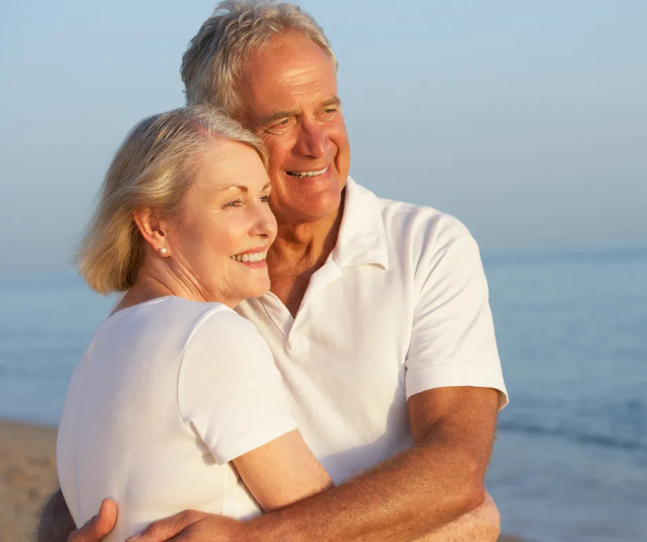 retired couple at the beach