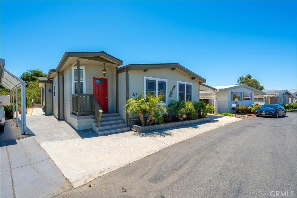 Single-story homes in a California retirement community with landscaped yards and a relaxed coastal setting.