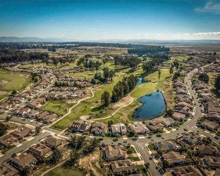 Retirement-friendly neighborhoods in Nipomo, California, with single-story homes, landscaped streets, golf courses, and open green space.