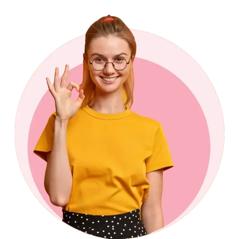 Young woman wearing glasses and a yellow t-shirt, smiling and making an OK hand gesture, framed by layered pink and beige circular shapes