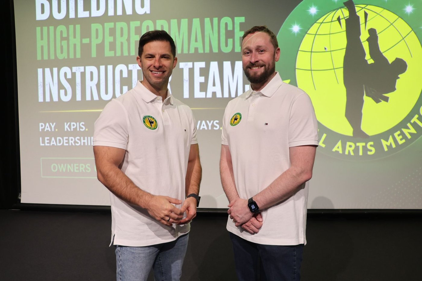 Mark Loughran and Hakan Manav presenting on stage