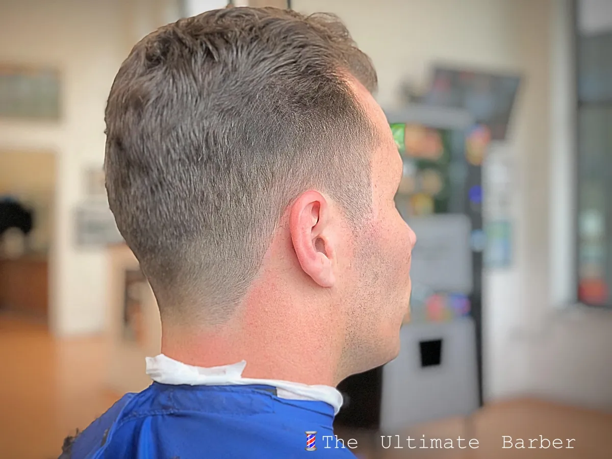 A master barber showcasing precision craftsmanship