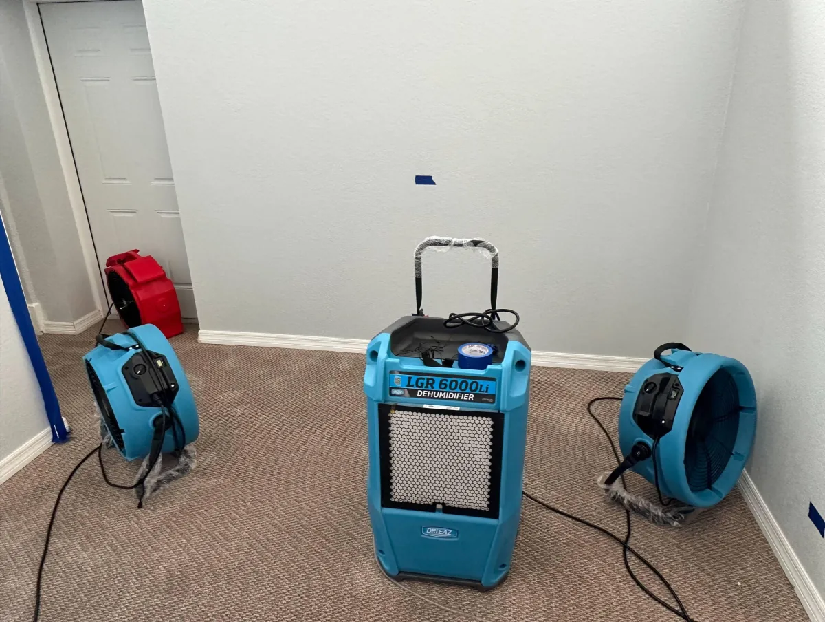 Garbage truck driving past office buildings