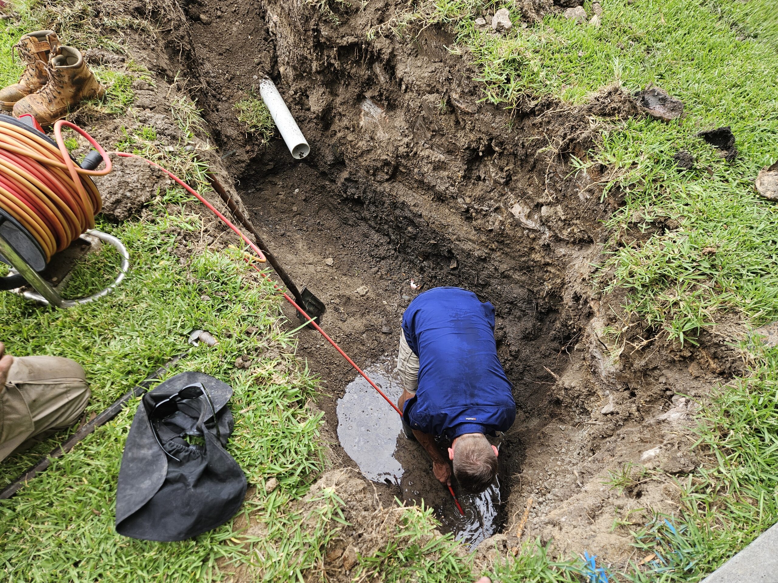 Owner of MSV Plumbing Services doing a CCTV drain inspection to ind the blockage and clear the drain.