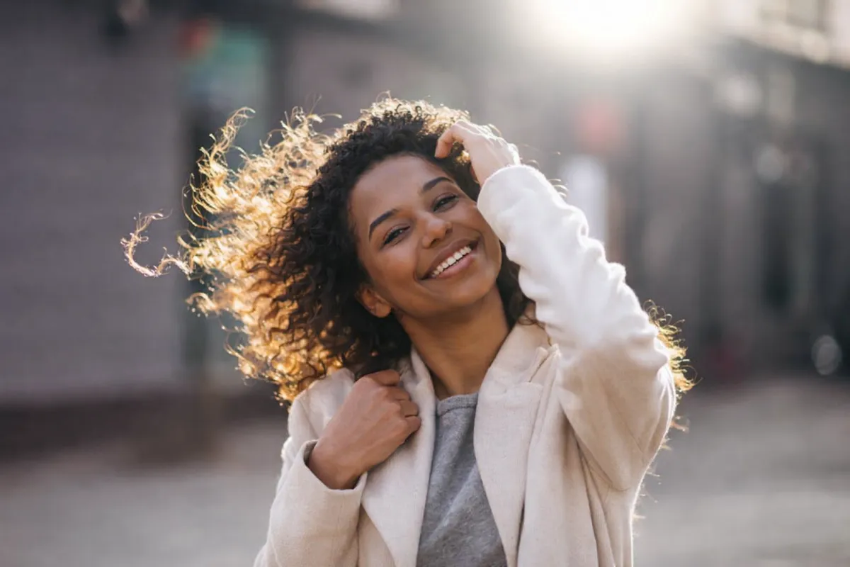Smiling woman representing anxiety relief