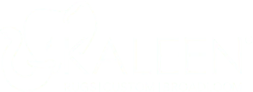 Kaleen logo featuring stylized text with the words "Rugs Custom Broadloom," representing a brand specializing in area rugs and custom flooring solutions.