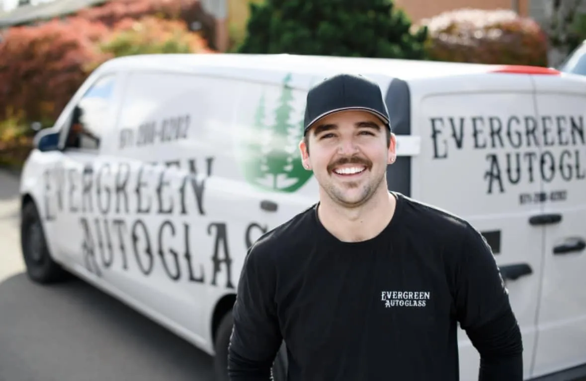 a table topped with lots of bottles of paint