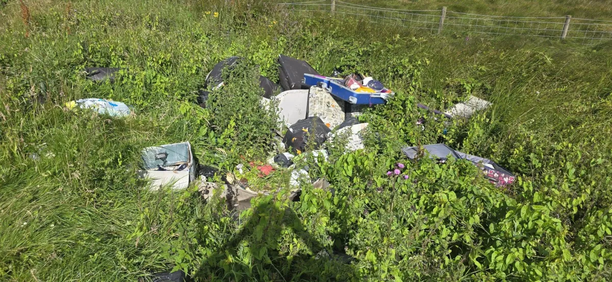 Household junk dumped at side of road illegally in Outlane Huddersfield 