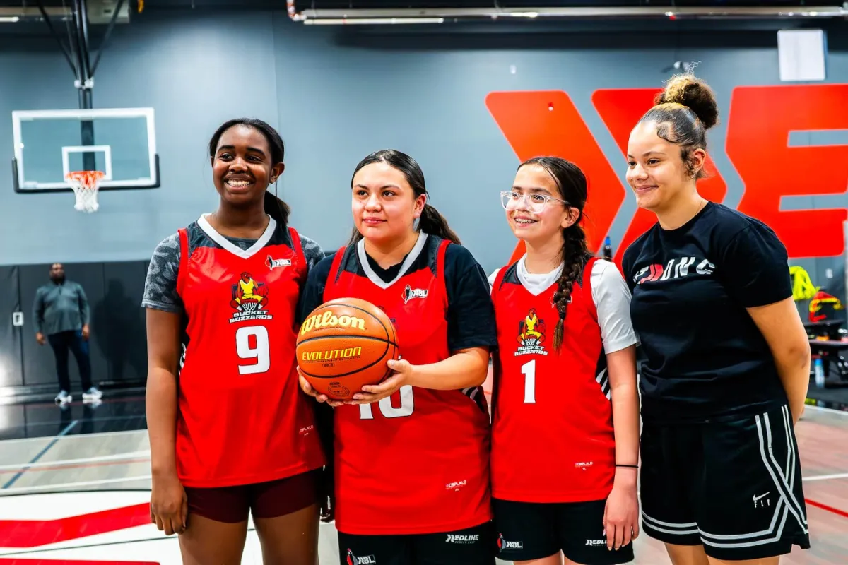 Youth athletes training and competing in basketball camps and leagues at RDE Sports Denver