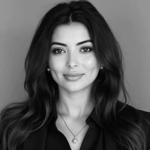Young woman meditating on the floor at home.