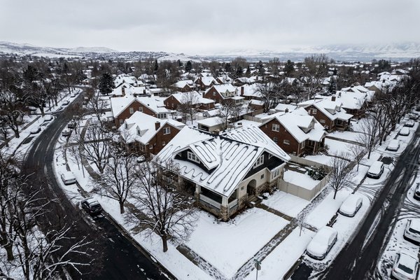 Complete ice dam protection with heat tape on snow-covered Sugar House roof, Salt Lake Valley, Utah