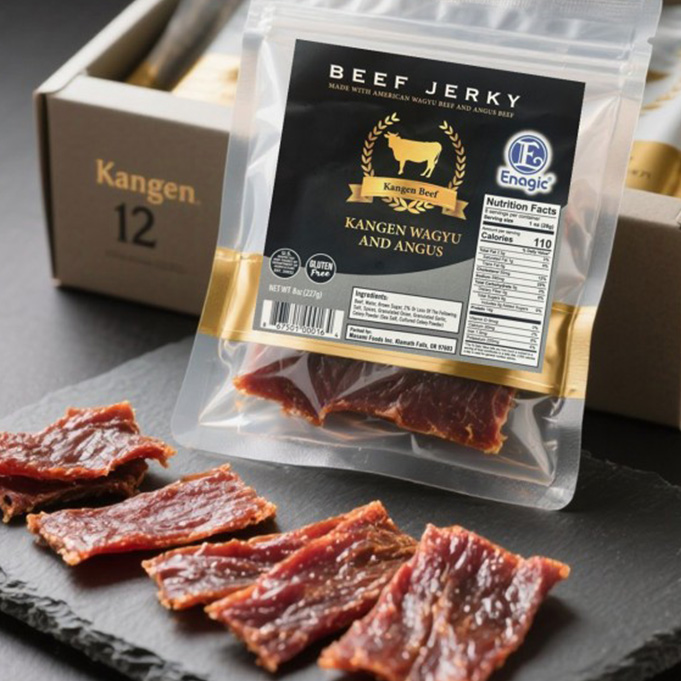 Packaged Enagic Kangen Wagyu and Angus beef jerky displayed in a clear pouch with loose jerky strips arranged on a dark slate board