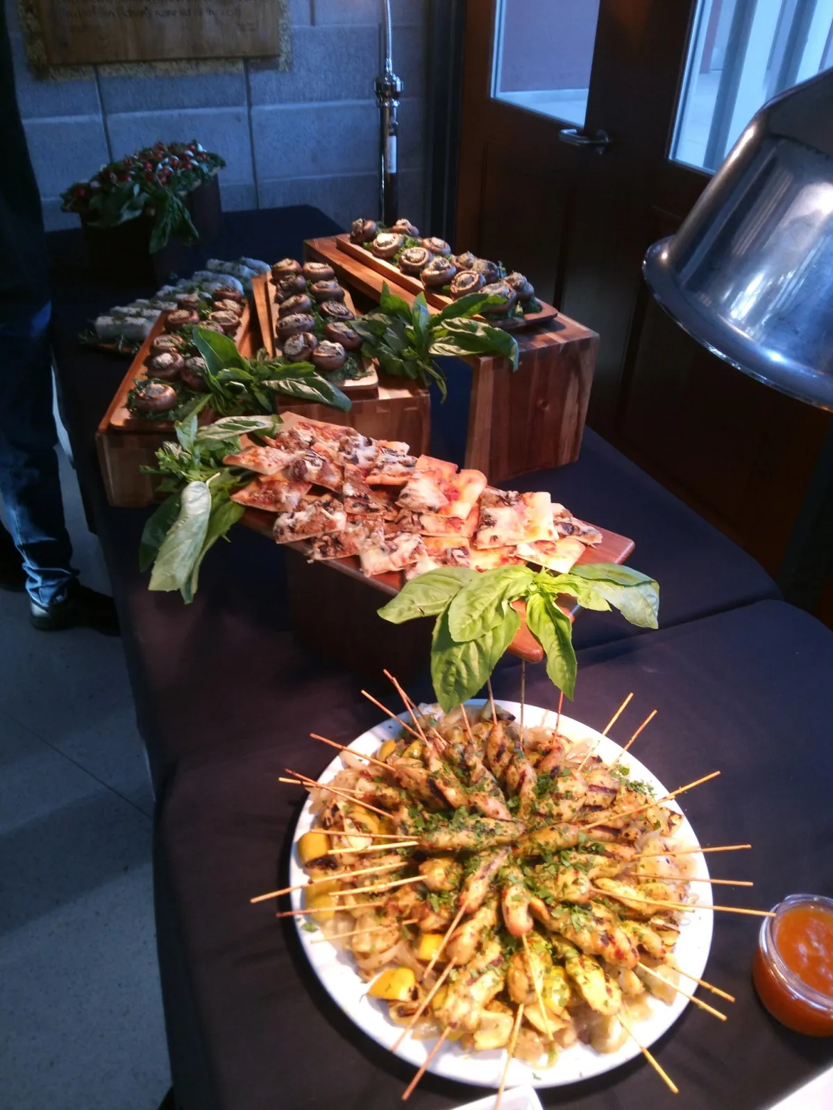 a white plate topped with a piece of chicken and veggies