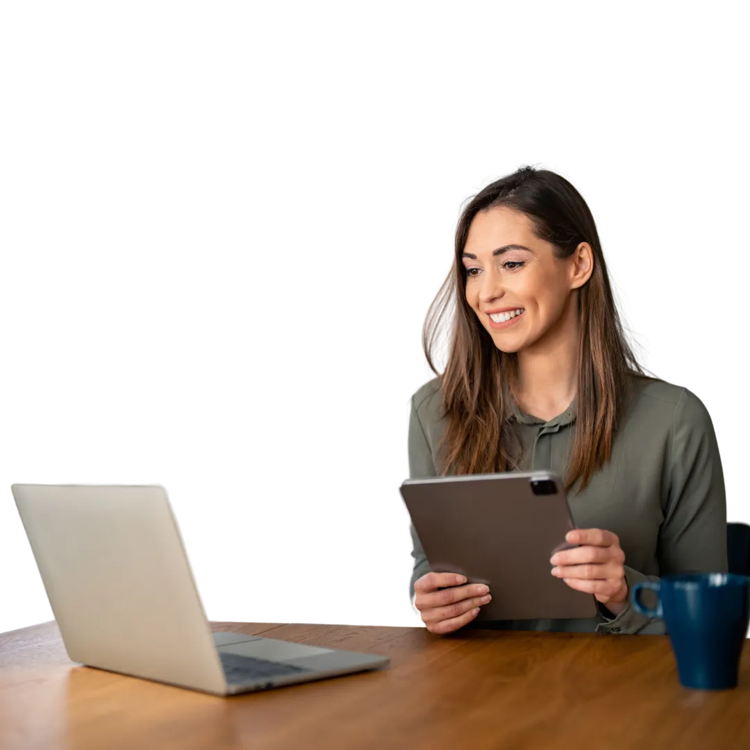 female woman coach looking at laptop screen smiling holding ipad