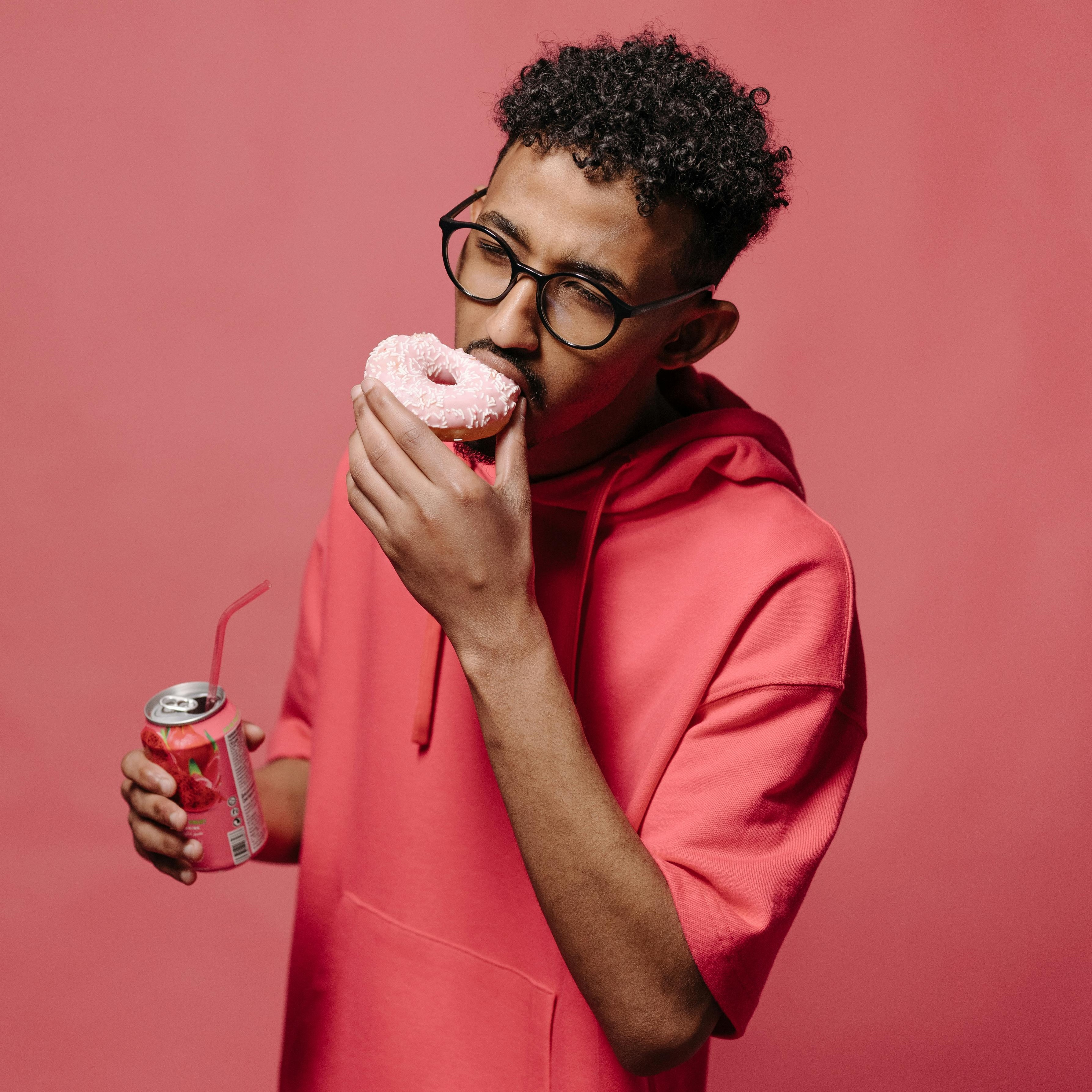 man eating donut