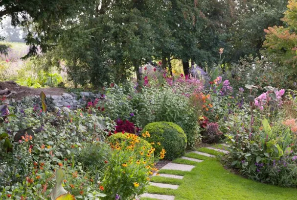 Extensive garden featuring a multitude of colorful and diverse flowers.