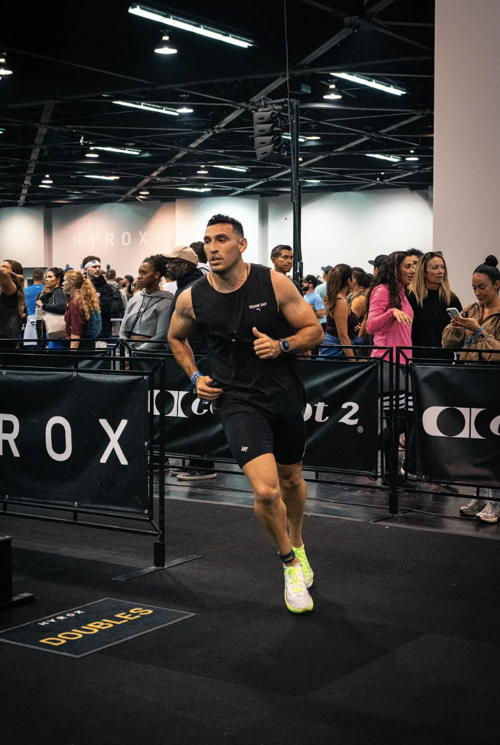 Coach Adan during a 1km HYROX run