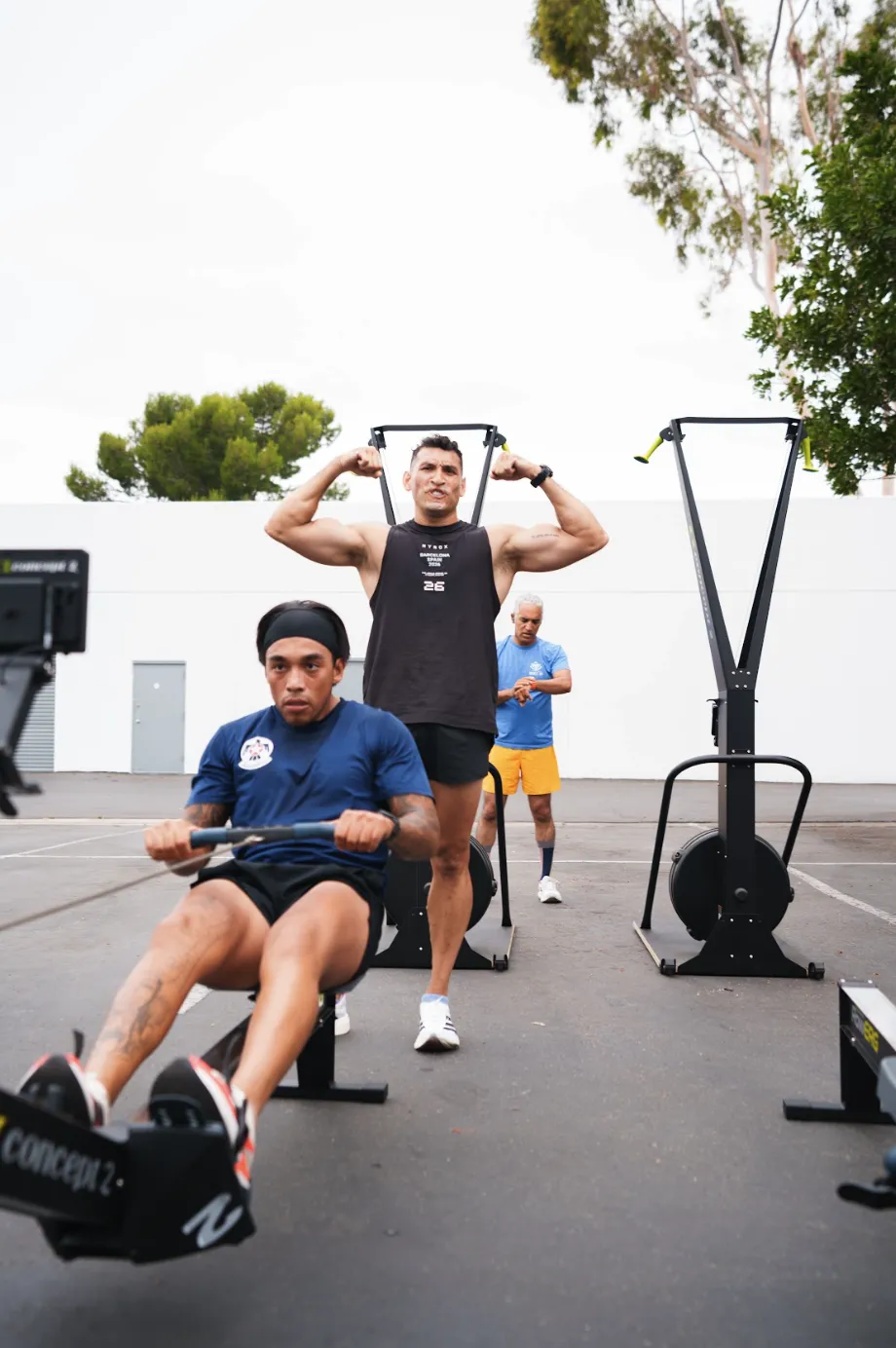 hyrox sim rowing as adan flexes