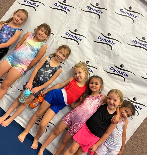 a man in a hammock on a city street