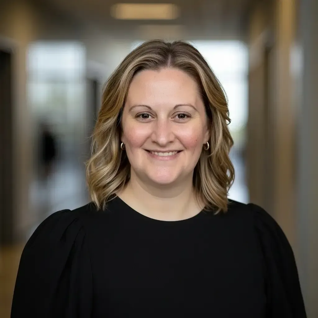 Professional headshot of Kate Geissel, founder of Gracewell Financial and Certified QuickBooks ProAdvisor.
