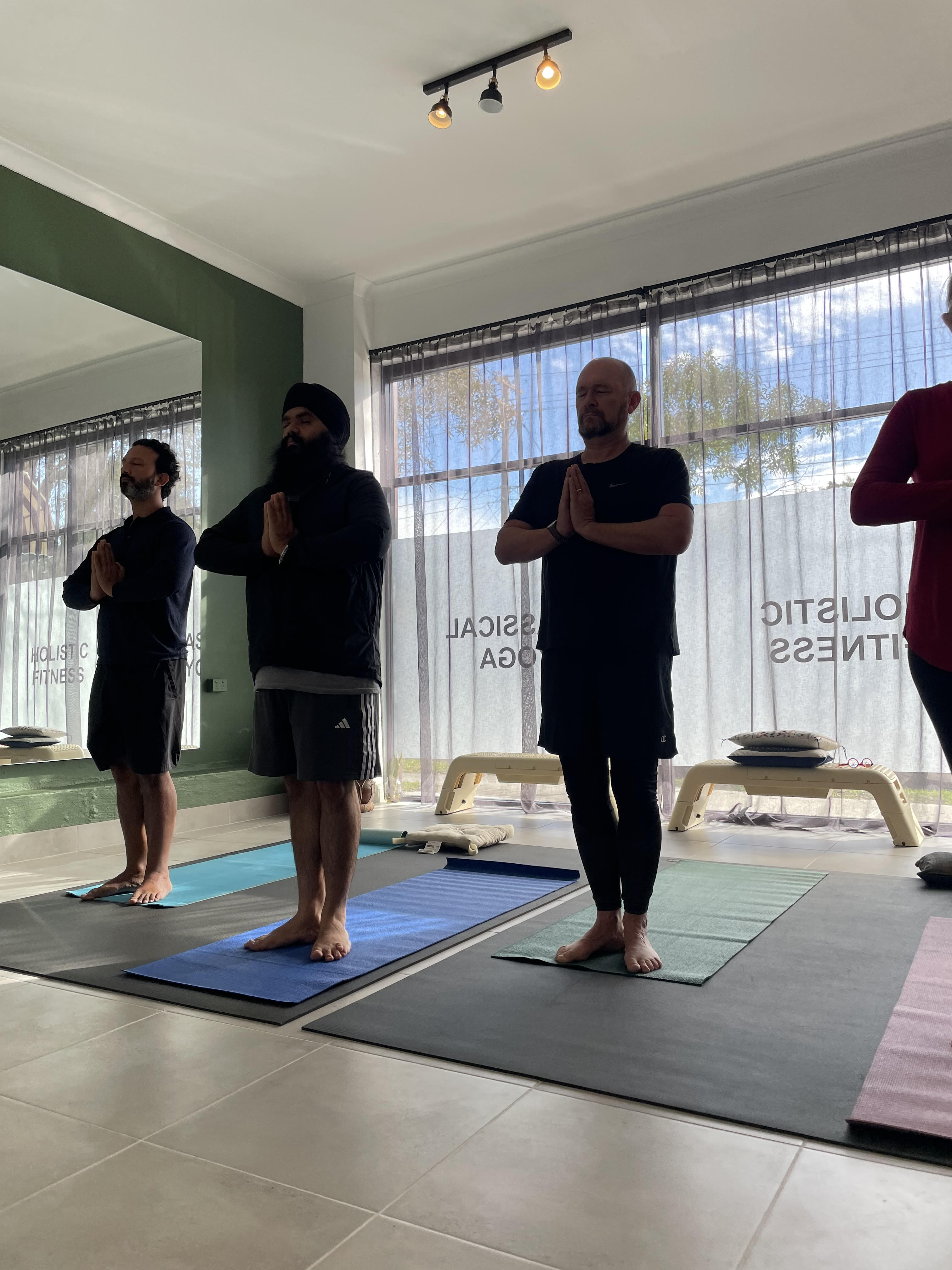 a small buddha statue sitting on top of a body of water