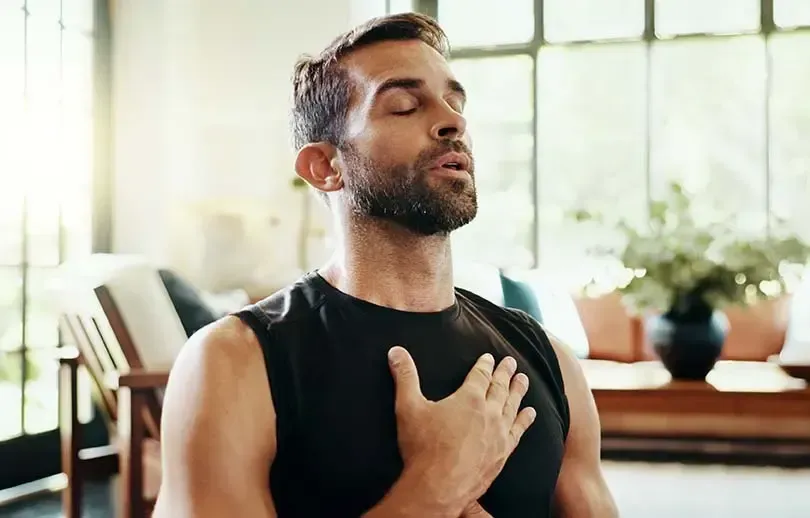 Male doing breathing exercises after a B complex injection.