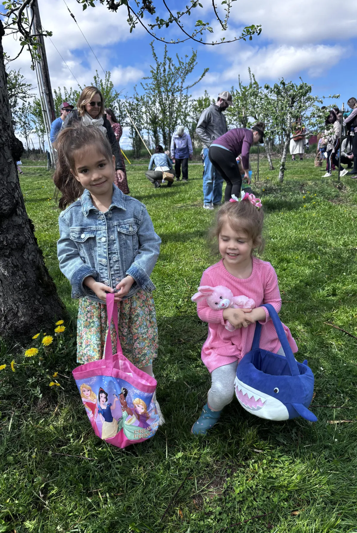Two young girls holding Easter baskets
