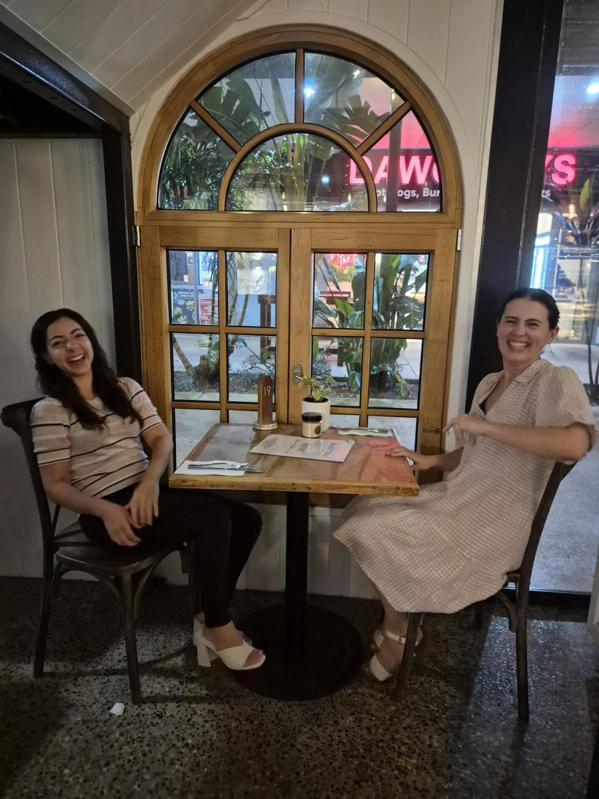 woman in red bikini lying on bathtub