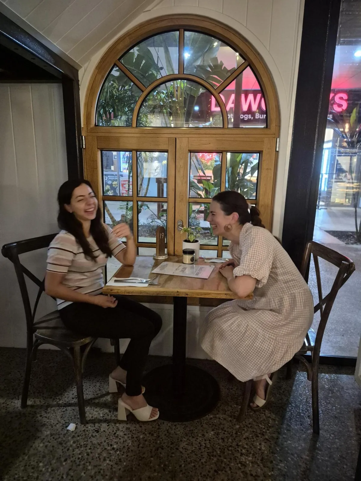 woman in red bikini lying on bathtub