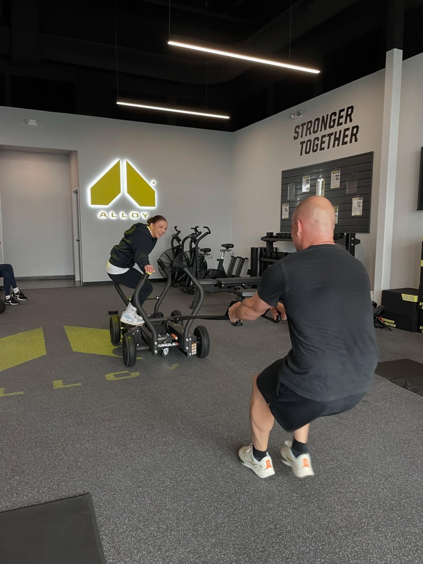 Women participating in small group fitness training with a personal trainer in Cedar Hills Crossing strength studio designed for adults over 40.