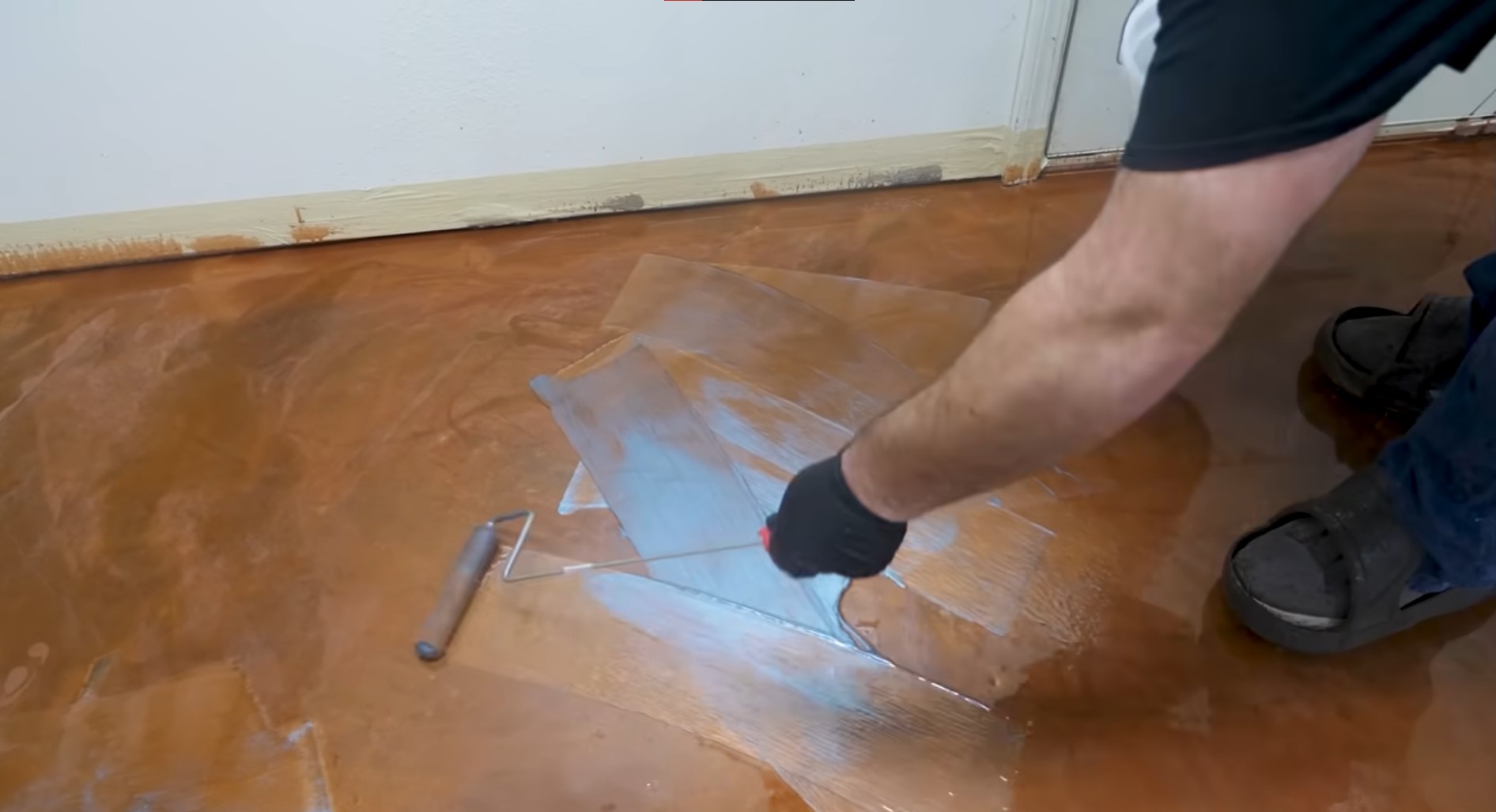 using epoxy roller to apply topcoat of sky blue blend