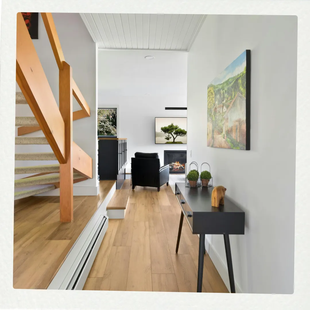 Phoenix Paintworks Mildura interior painting excellence displayed in a modern hallway with immaculate white wall finishes, professionally painted timber staircase, and seamless paint transitions throughout the architectural features.