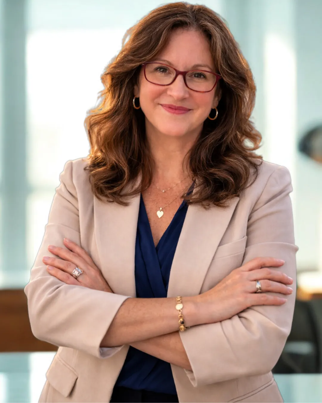 Photo of April Cox in red blazer