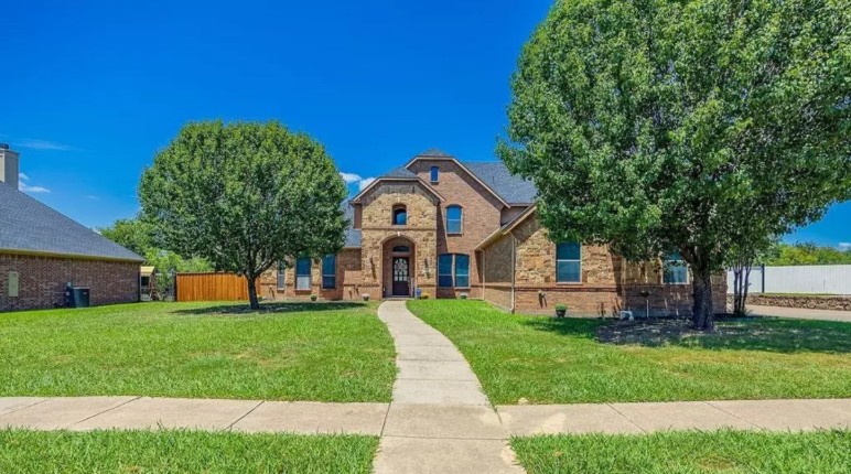 The exterior of a DFW home managed by Louis Pacheco.