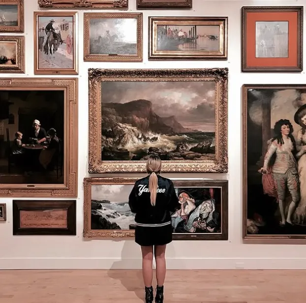 A group of small boats floating on top of a lake