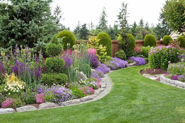 Maintained garden bed with native shrubs and grasses in Prebbleton