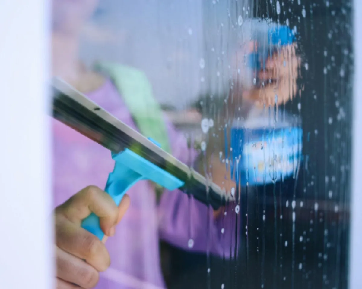 Lawn mower in action on residential lawn during regular service in West Melton