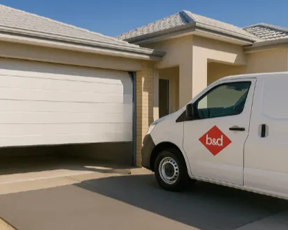 a B&d repair van out the ont of a garage door that is not all the way down