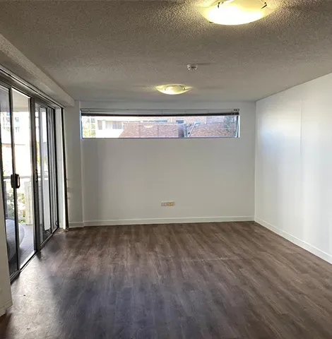 Interior house painters painting job in Wishart, Brisbane: freshly painted white living room walls