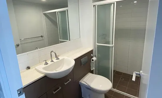Moisture-resistant bathroom walls painted by an interior house painting crew in Brisbane