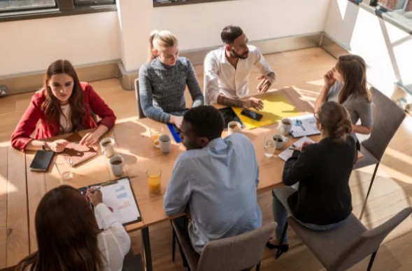 team sitting at a table
