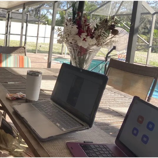 laptop on a patio table