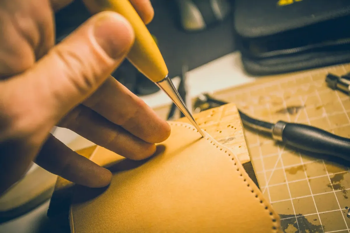 hand stitching leather together